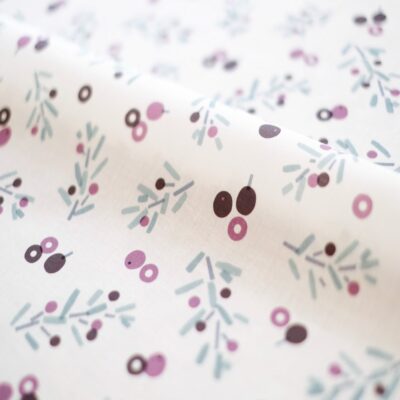 A combination of fruit swaying rhythmically in the wind and cut round silhouettes.