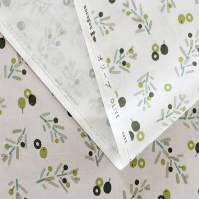 A combination of fruit swaying rhythmically in the wind and cut round silhouettes.